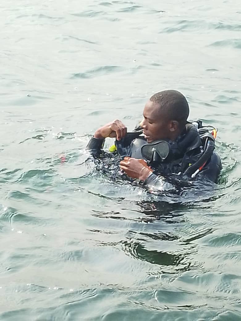 Diver smiling on the dive support boat